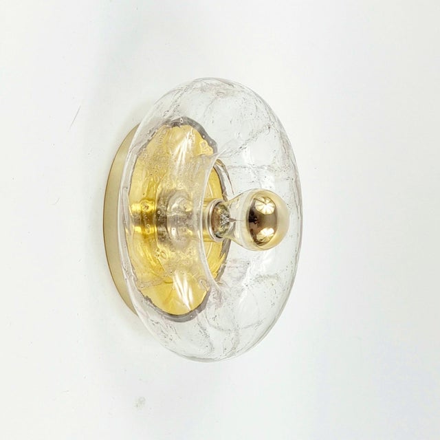 Stunning donut-shaped mid century modern wall light/sconce from Doria, Germany, 1960s. Round biomorphic transparent glass...