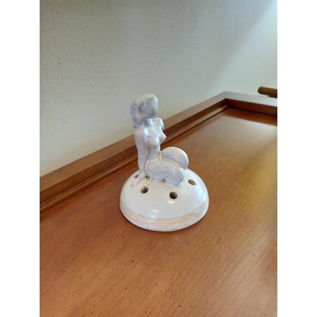 Vintage Nude Ceramic Flower Frog. Frog is in good vintage condition without chips or cracks, but does have some visible...