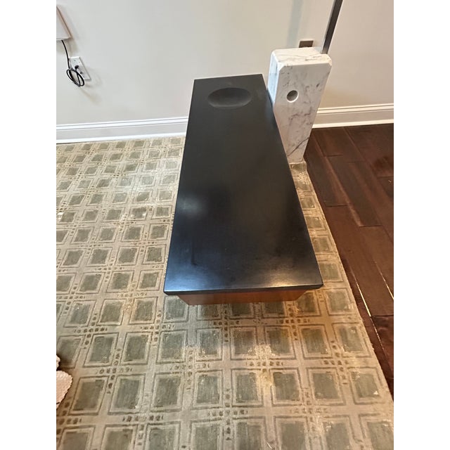 Beautiful hand crafted custom low cocktail table or meditation altar having black heavy stone top with circular...