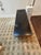 Beautiful hand crafted custom low cocktail table or meditation altar having black heavy stone top with circular...