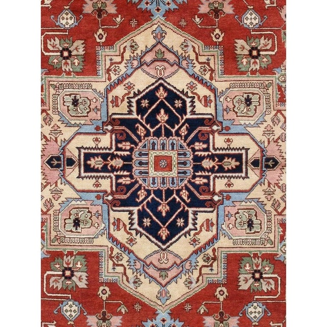 The Pasargad Home Serapi Collection offers traditional rugs crafted with exceptional attention to detail. Each rug is...