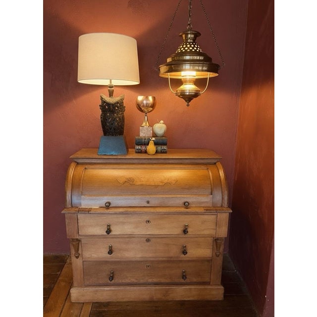 A sculptural vintage table lamp dating to the late 1960s or early 1970s, featuring a detailed cast metal owl with pierced...