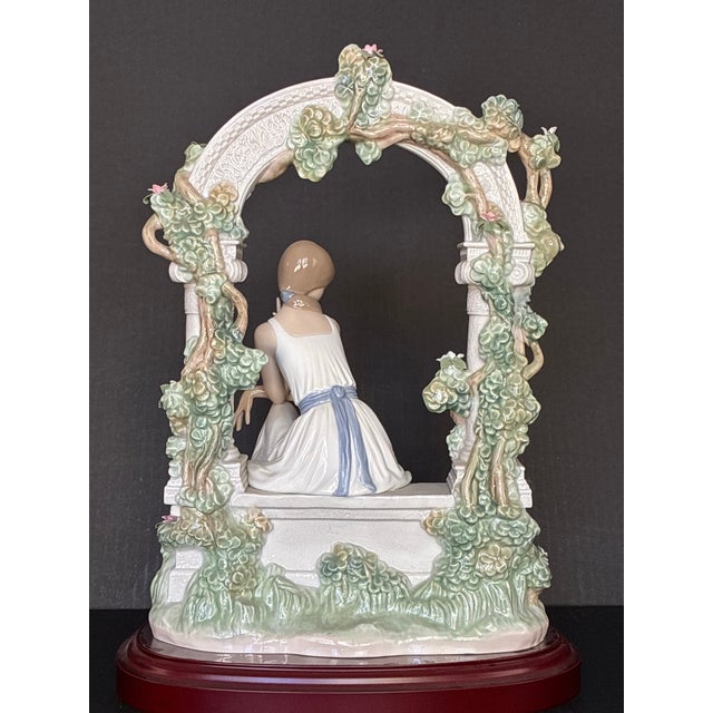 Lladró Tranquility (Model #06677) Porcelain Figurine, Featuring a Seated Woman Under a Floral Arbor For Sale In Los Angeles - Image 6 of 6