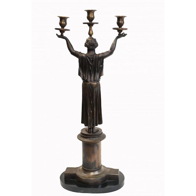 You are viewing a gorgeous pair of French bronze candelabras in the Empire style Great look to this pair as the maidens...