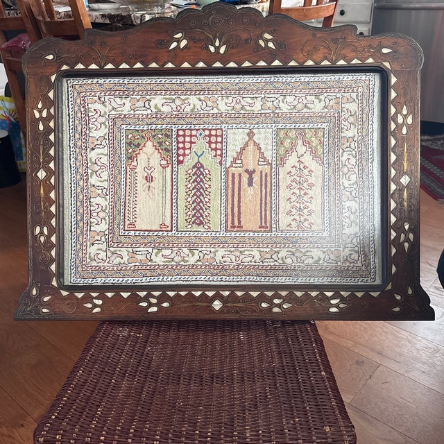 Antique Silk Prayer Rug professionally Framed in Antique Wood Frame with Mother of Pearl and Brass Inlay. This is a...