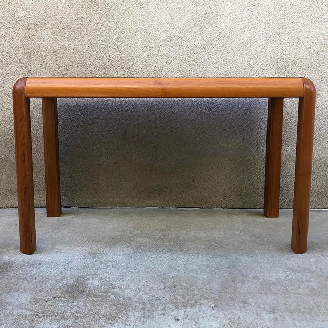 This vintage console table is a striking piece designed by Gangsø Møbler, a renowned Danish furniture company known for...