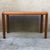 This vintage console table is a striking piece designed by Gangsø Møbler, a renowned Danish furniture company known for...