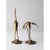 A pair of mid-century brass crane sculptures featuring finely detailed craftsmanship that captures the graceful elegance...
