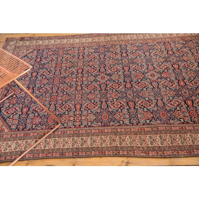 :: Allover covered field in a herati motif and germinating plant main border. Fine quality weave, with excellent color...