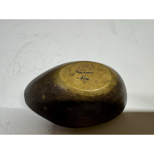 Carl Auböck Il 1900-1957 ashtray, model 3597 Austria, 1948 patinated brass Dimensions:2h × 4¼w × 2½d in (5 × 11 × 6 cm)...