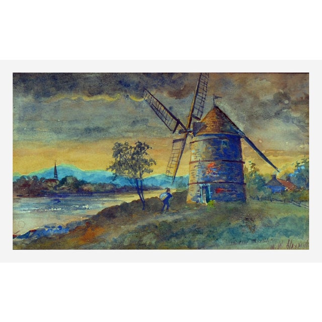 Inlet and windmill, a watercolor painting by William Walker Alexander (Canadian, 1870-1948). Presented a giltwood frame....