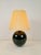 A black opaline glass spherical table lamp, in the style of jacques adnet, circa 1950s designer: jacques adnet - model:...