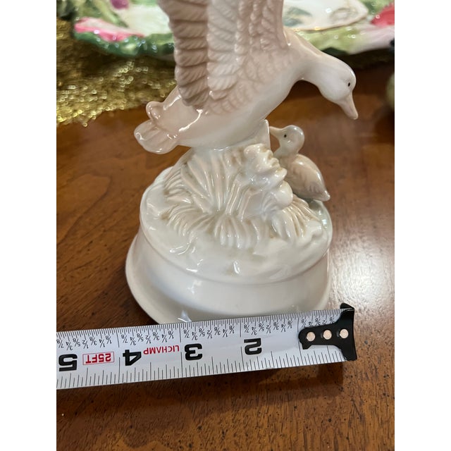 Up for consideration is a beautiful vintage white ceramic duck and duckling music box figurine. This would look lovely in...