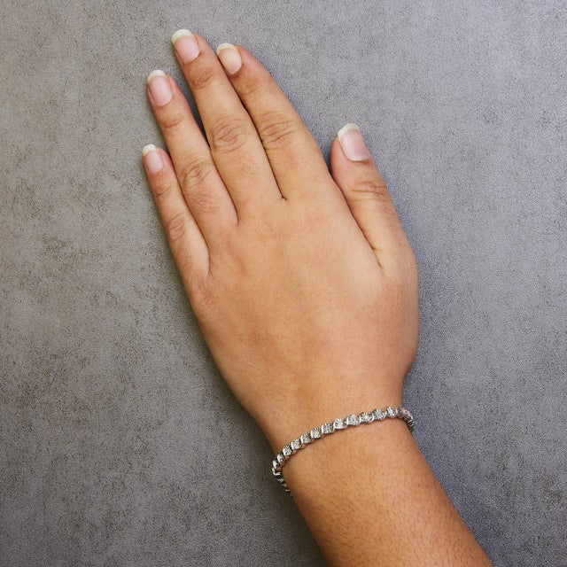 .925 Sterling Silver 1/10 Cttw Diamond Round Miracle Plate and "S" Link Tennis Bracelet - 7" For Sale In New York - Image 6 of 7