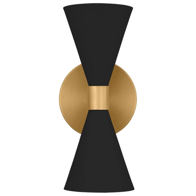 The Albertine chandelier by AERIN for Visual Comfort Studio Collection emits ample light above and below from eight...