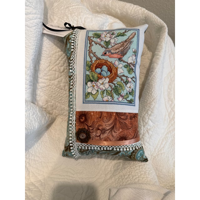 Original pillow design by Carol featuring hand stitched insert. Counted cross stitch bird with nest. Pillow has ribbon,...