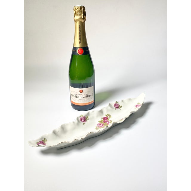 This porcelain is a dish, that has been made in France, circa 1970. The Decor pattern are roses, and the color is white...