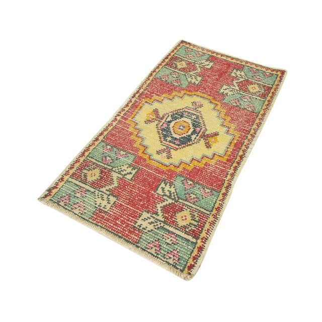 Vintage Handknotted decorative mini rug from Konya region of Turkey. Approximately 45-55 years old. In very good condition.
