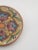 This hand-painted hanging plate is from the Italian medieval hill town of Erice (Sicily), where Majolica ceramics have...