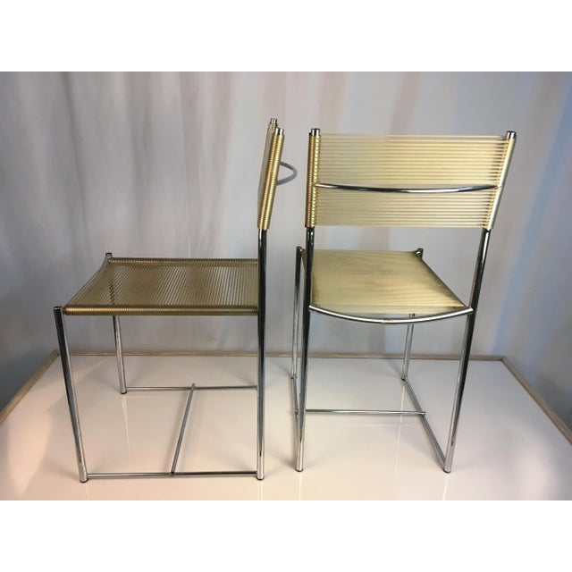 Very chic, mid century modern pair of chairs by Alias. Italian style and craftsmanship!