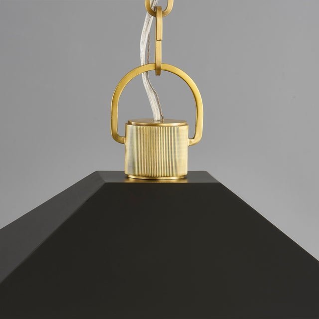 Natick is clean, open, and airy. The double roofline stands out from a traditional lantern, while the Aged Brass metal...