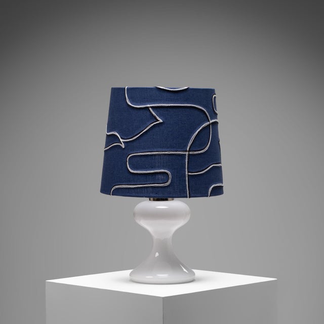 Designed by Ingo Maurer, this sculptural table lamp exemplifies the designer’s ability to transform simple forms into...