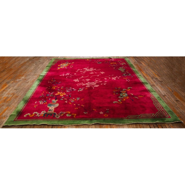 This antique rug is a Chinese Art Deco piece from circa 1920. It represents the distinctive style woven between the world...
