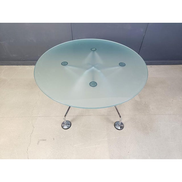 This dining table was designed by Sir Norman Foster for Tecno. Originally designed for use in his London office, this...