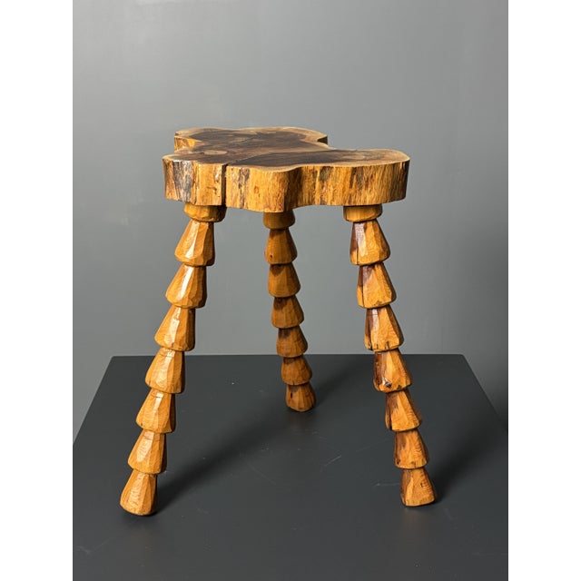 Stunning and rare midcentury brutalist French artisanal handmade wood turned tripod stool, ca 1960s in great vintage...