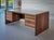 The bold rosewood panels showcase the naturally occurring, artwork-like grain patterns uniquely found in Brazilian...