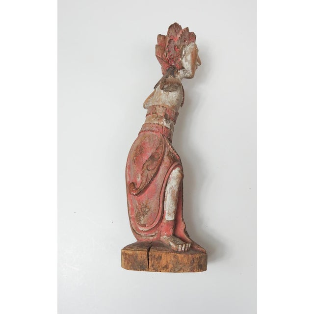 Late 19th century hand carved wood southeast asia polychrome figure. Residual colors are pink and white, nice crisp...