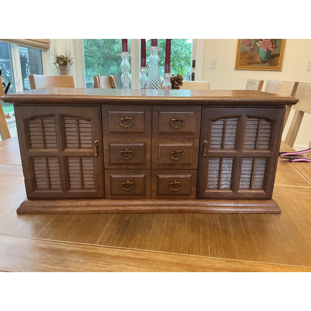 Add sophisticated storage and vintage warmth to your vanity or dresser with this vintage mid-century wooden jewelry...