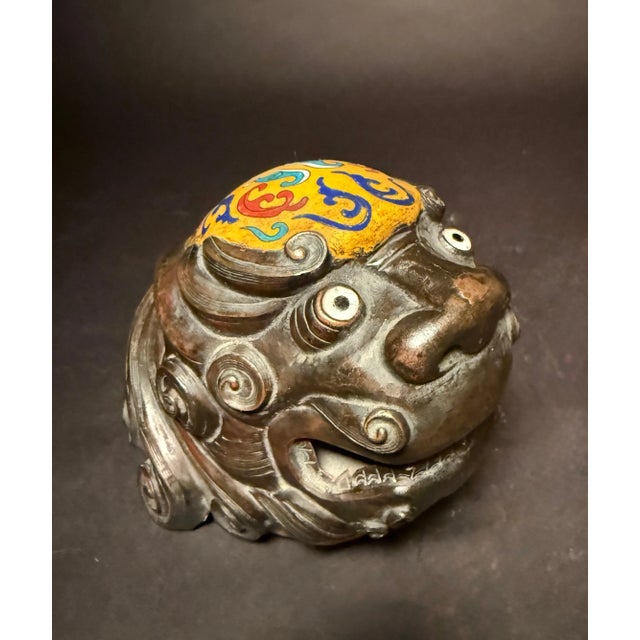 Beautiful fine pair of Chinese cloisonne enamel foo lion censers, in a standing pose. Yellow enamel ground and stylized...