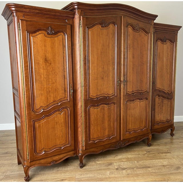 This elegant Vintage French Louis wardrobe offers impressive storage capacity and timeless continental styling. Featuring...