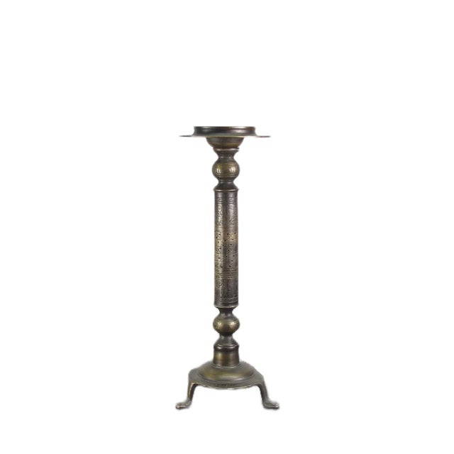 This vintage solid Turkish brass candle holder with hand etched patterns is a unique piece that can be used as a candle...