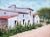 Impressionist Spanish Bungalo with Red Flowers, Rugero Valdini, Painting For Sale - Image 3 of 3
