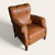 A well-proportioned German lounge chair dating to the 1960s, upholstered in warm cognac leather. The chair features a...