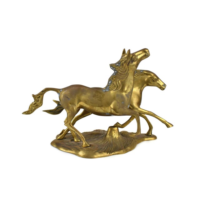 Stunning gold brass running wild stallion or mustang horses figurine. Beautiful statement piece to enhance any décor or...