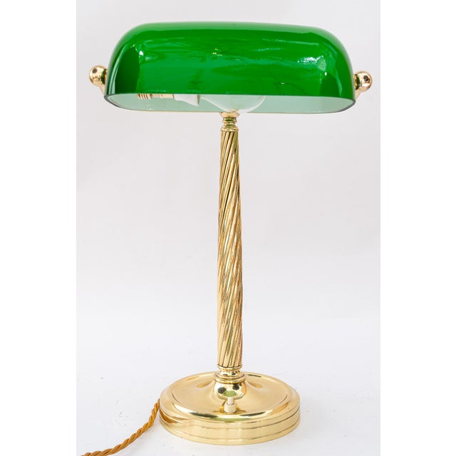 Solid Banker table lamp with original glass shade vienna around 1920s. European Plug (up to 250V).The wiring of this item...