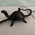 An unusual lock, circa early 20th century. Metal, likely brass, in the shape of a turtle/tortoise, and with a long key...