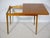 Folding dining table by Wilhelm Renz from the 1960s/70s with a warm walnut finish and a clean, minimalist design. The...