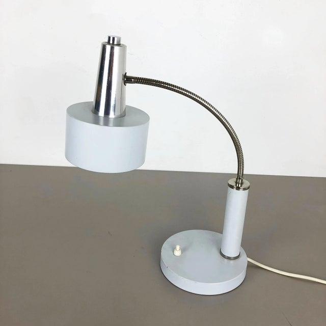 Table light Origin: Germany Producer: SIS lights, Germany attrib. Material: Metal Age: 1960s Description: This original...