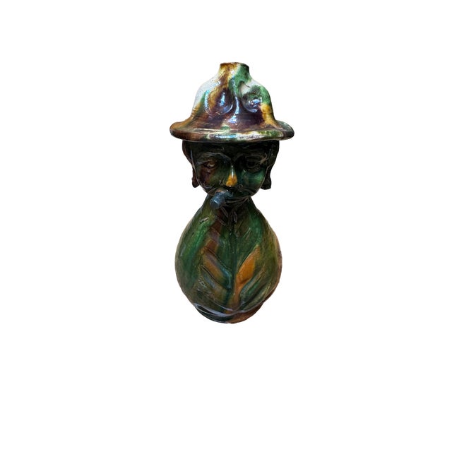 Antique French ceramic character jug in beautiful greens, browns and yellows. 19th C. Approx. 12” H x 5” W x 5” D