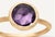 This gorgeous ring by Italian designer Marco Bicego and from their Jaipur Collection, contains a round rose cut amethyst...