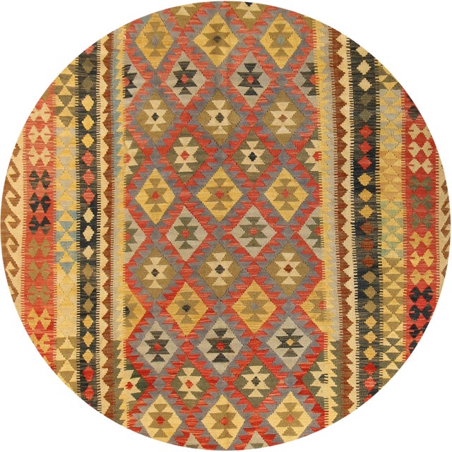 Beautiful Contemporary Kilim Rug, hand-knotted wool with a multi color field in an allover geometric design. This rug...