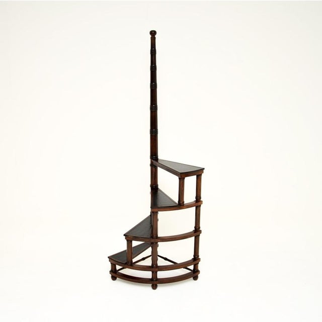 A large and impressive set of antique leather top library steps in the Georgian style. They were made in England, and date...