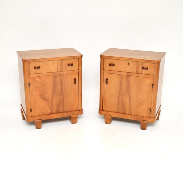 A superb pair of Swedish Art Deco walnut bedside cabinets. They were recently imported from Sweden, they date from the...