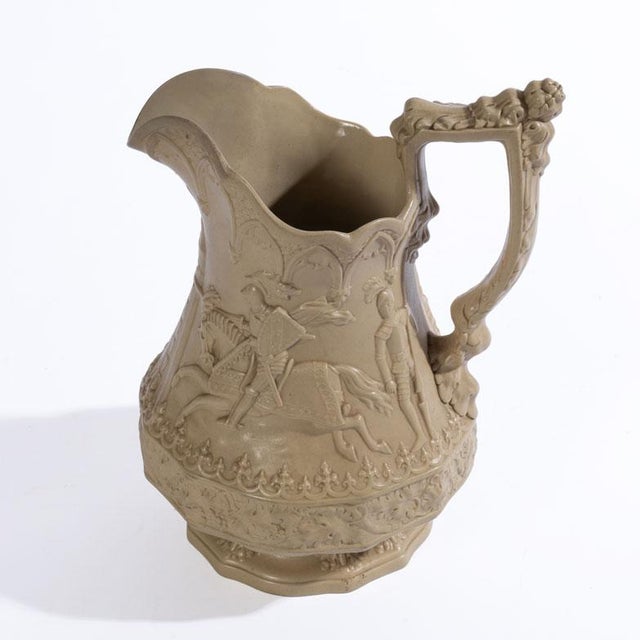 1840's English Salt Glaze Drabware Jug in the Jousting Knights Pattern by William Ridgway