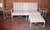 A Vintage Brown Jordan outdoor patio Sofa/Sette, Ottoman and two (2) Accent tables. This vintage set features cream tone...