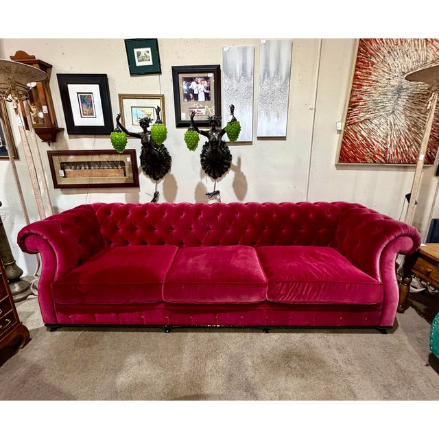 Make a dramatic statement with this striking Christopher Guy McQueen Chesterfield-style sofa, upholstered in rich red...